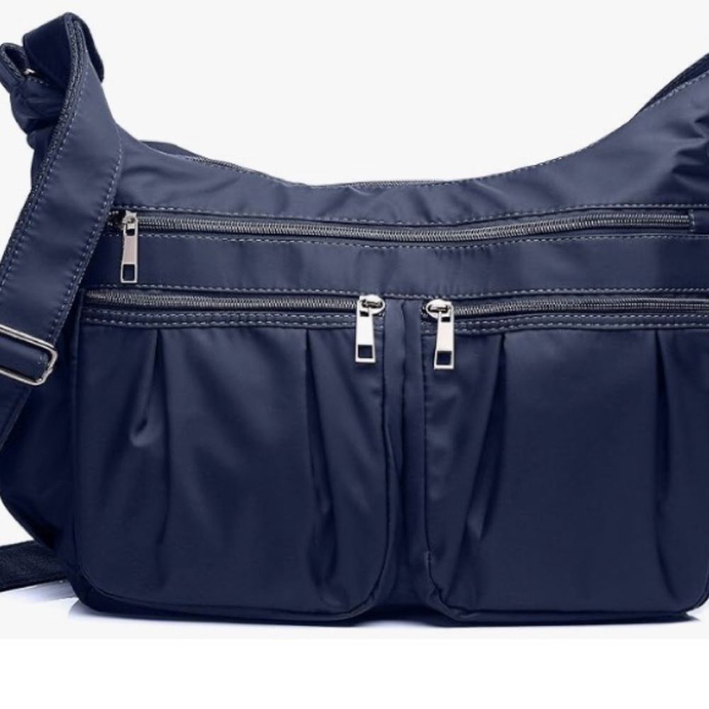Crossbody bag with outside pockets